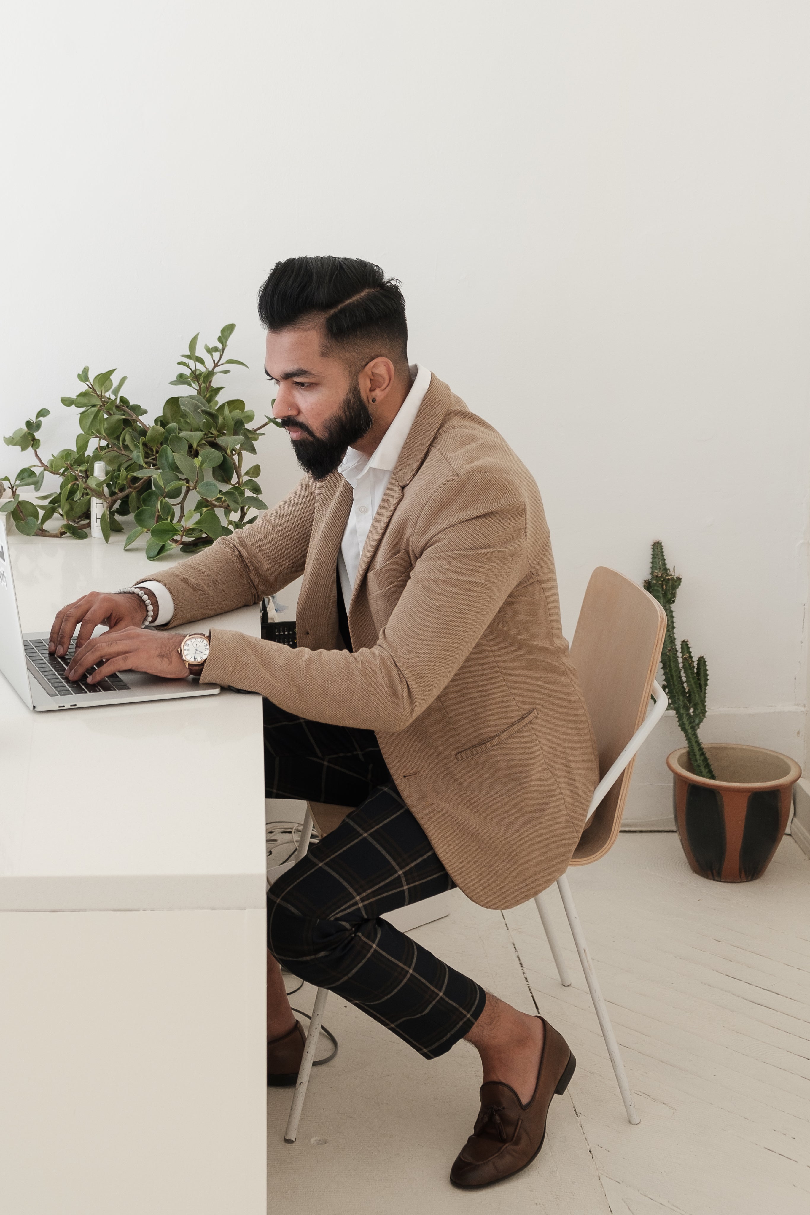 files/well-dressed-store-owner-checks-on-his-online-store.jpg